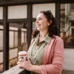 middle aged woman with coffee cup