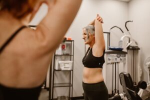 middle aged woman in weight room