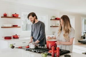 man-and-woman-on-kitchen